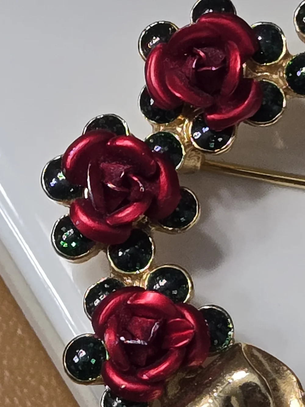 Avon Gold Bow Wreath Brooch with Red Roses and Green Accents